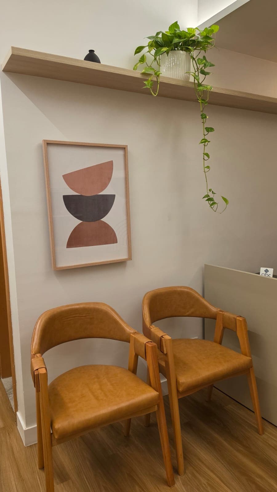 Área de estar com poltronas